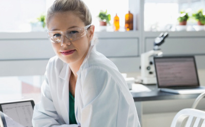 Scientist in a lab Milli-Q® Benchtop Systems